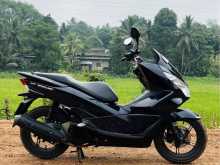 https://riyasewana.com/uploads/honda-pcx-150-2213305522932.jpg