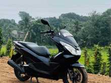 https://riyasewana.com/uploads/honda-pcx-150-2213305522973.jpg