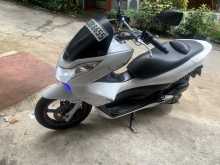 https://riyasewana.com/uploads/honda-pcx-150-2719344913043.jpg