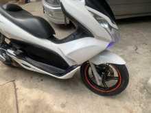 https://riyasewana.com/uploads/honda-pcx-150-2719344913454.jpg