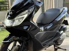 https://riyasewana.com/uploads/honda-pcx-150-3019053022652.jpg