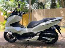 https://riyasewana.com/uploads/honda-pcx-160-2118110913843.jpg