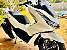 https://riyasewana.com/uploads/honda-pcx-160-2415461813043.jpg
