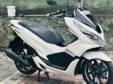 https://riyasewana.com/uploads/honda-pcx-1614331124362.jpg