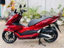 https://riyasewana.com/uploads/honda-pcx-1710312822702.jpg