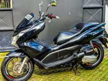 https://riyasewana.com/uploads/honda-pcx-181204594552.jpg