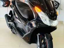 https://riyasewana.com/uploads/honda-pcx-2711233113852.jpg