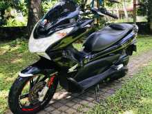 https://riyasewana.com/uploads/honda-pcx-313460213633.jpg