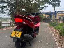 https://riyasewana.com/uploads/honda-pcx-red-2315520422162.jpg