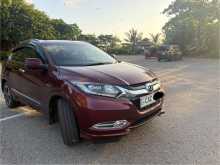 https://riyasewana.com/uploads/honda-vezel-orange-14140643896.jpg