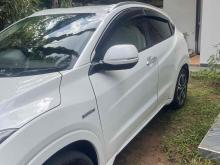 https://riyasewana.com/uploads/honda-vezel-orange-290302524322.jpg