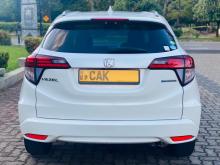 https://riyasewana.com/uploads/honda-vezel-red-2619472517306.jpg