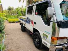 https://riyasewana.com/uploads/isuzu-elf-150-91242434522.jpg