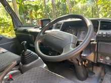 https://riyasewana.com/uploads/isuzu-elf-2000-2523365812864.jpg