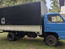 https://riyasewana.com/uploads/isuzu-elf-250-12826124652.jpg