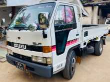 https://riyasewana.com/uploads/isuzu-elf-250-1993-236562012642.jpg