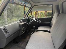 https://riyasewana.com/uploads/isuzu-elf-250-211342424621.jpg