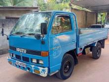 https://riyasewana.com/uploads/isuzu-elf-250-483420454367.jpg