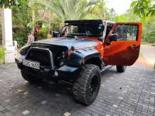 https://riyasewana.com/uploads/jeep-wrangler-2014-49294912373.jpg