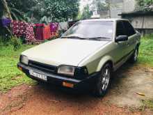 https://riyasewana.com/uploads/mazda-323-1987-2714431912392.jpg