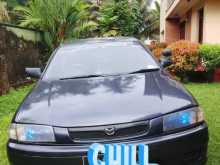Mazda Familia 1999 Car