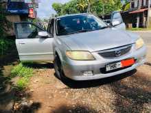 Mazda Familia 2002 Car