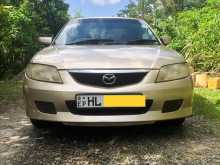 Mazda Familia 2003 Car