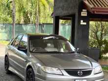 Mazda Familia 2003 Car