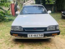 Mazda FAMILIA 1991 Car