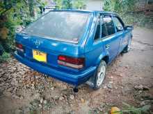 https://riyasewana.com/uploads/mazda-familia-323-1986-1617173112863.jpg