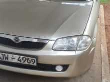 Mazda Familia 323 2000 Car