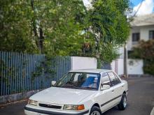 https://riyasewana.com/uploads/mazda-familia-323-2118432017056.jpg