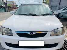 Mazda FAMILIA 1999 Car