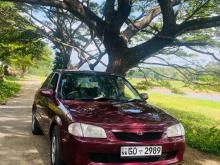Mazda Familia 1999 Car