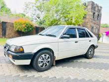 https://riyasewana.com/uploads/mazda-familia-bftp-101414236973.jpg