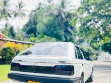 https://riyasewana.com/uploads/mazda-familia-bftp-101414466536.jpg
