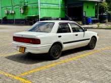 https://riyasewana.com/uploads/mazda-familia-bg3p-1997-113581112442.jpg