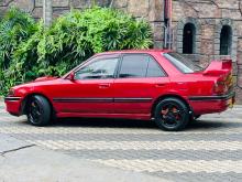 https://riyasewana.com/uploads/mazda-familia-bg5p-201010026652.jpg