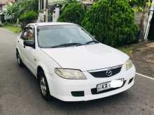 https://riyasewana.com/uploads/mazda-familia-bj3p-2001-57244712302.jpg