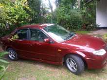 https://riyasewana.com/uploads/mazda-familia-bj5-2003-818465412534.jpg