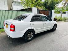 https://riyasewana.com/uploads/mazda-familia-bj5p-19822487003.jpg