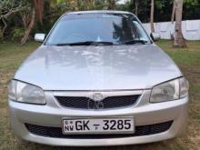 Mazda Familia BJ5P 1999 Car