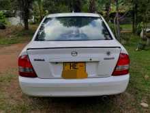 https://riyasewana.com/uploads/mazda-familia-bj5p-2000-717295812402.jpg