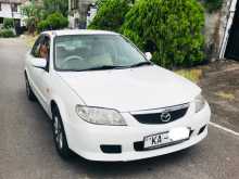 https://riyasewana.com/uploads/mazda-familia-bj5p-2001-217065012412.jpg