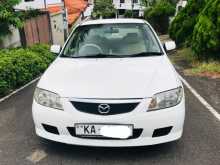 Mazda Familia BJ5P Prado Light Model 2001 Car