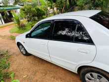 https://riyasewana.com/uploads/mazda-familia-bj5p-2001-67594112344.jpg