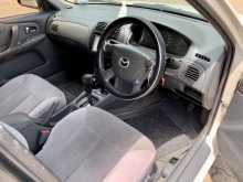 https://riyasewana.com/uploads/mazda-familia-bj5p-2004-1812561212174.jpg