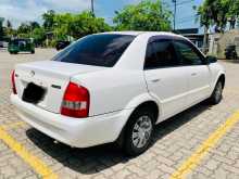 https://riyasewana.com/uploads/mazda-familia-bj5p-2004-1812561212342.jpg