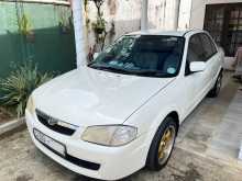 Mazda Familia BJ5P 1999 Car