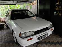 Mazda Familia BF Sedan 1987 Car